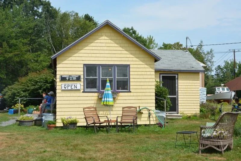 Small yellow Hitty’s Cafe building on Great Cranberry Island